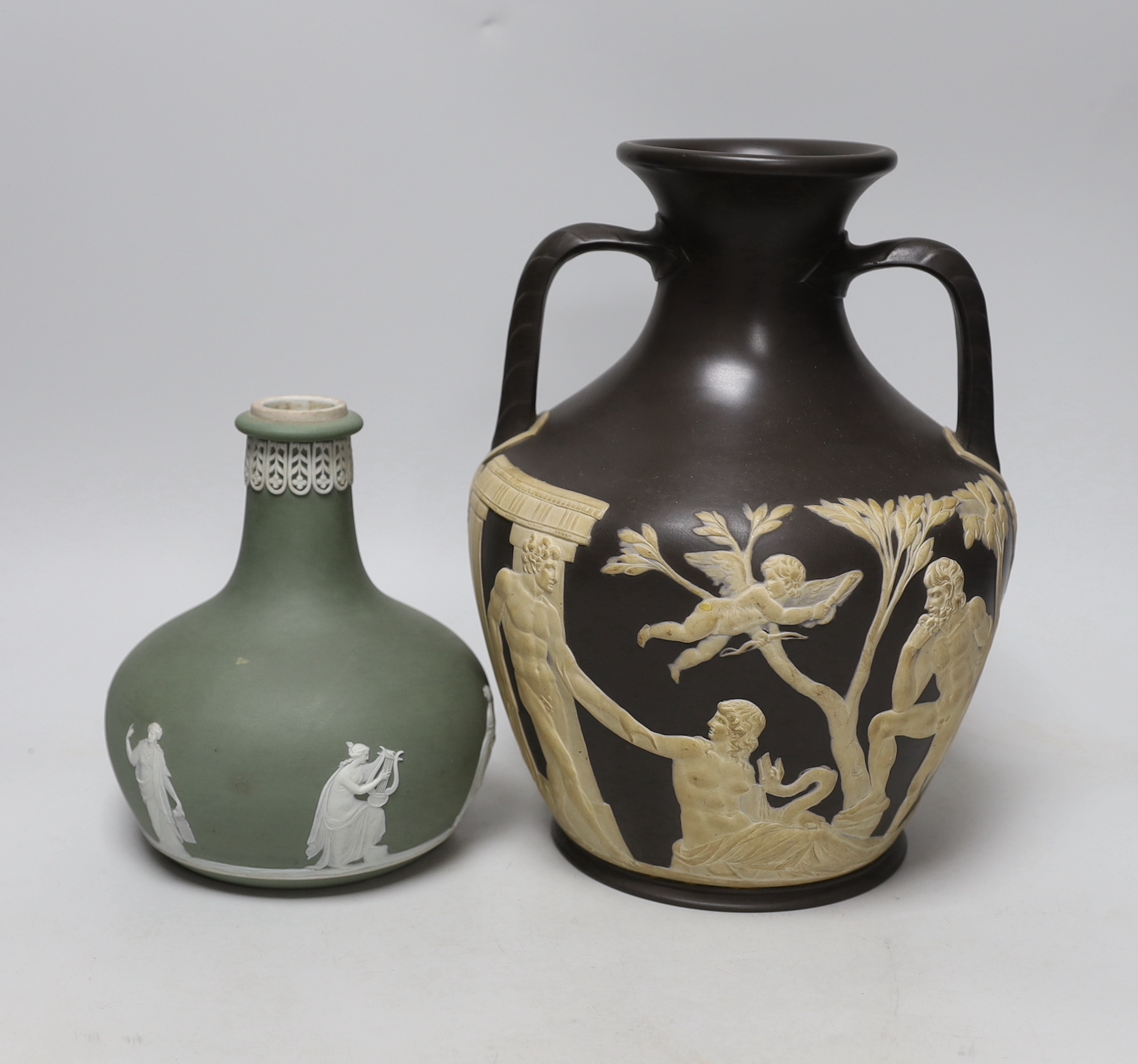 Attributed to Wedgwood, a jasper ware copy of the Portland vase, unmarked and a Wedgwood jasperware vase, tallest 25cm